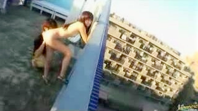 Pervert boy fucks Oriental girl atop building