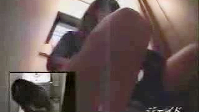 Sexy Japanese girl masturbating in public toilet caught on camera
