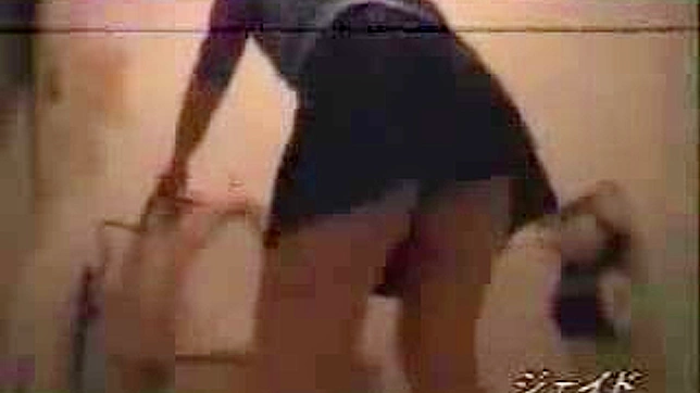 Secretly Captured! Woman Intimate Moment in Public Toilet