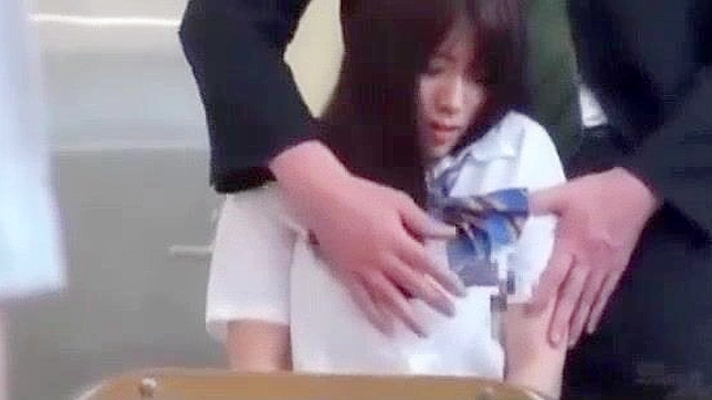 Japanese College Teen gets armpit fucked while giving blowjob and handjob in class