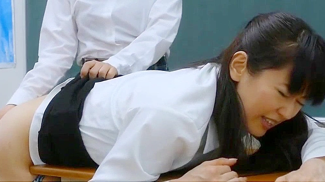 Japanese Lesbian Teacher Spanks Brunettes in Porn Video