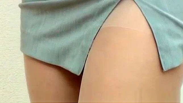Japanese MILF Teacher in Stockings Exposes Ass