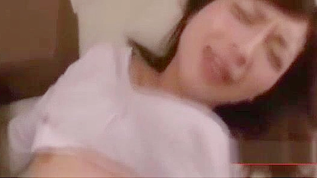 Japanese Office Lady in Stockings Gets Facial on Couch with Boyfriend