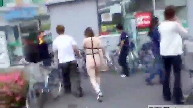 Naked Japanese girl paraded around in public for your XXX pleasure!