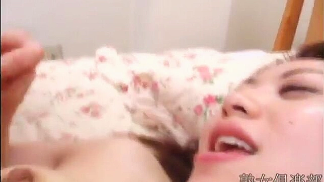 Unleash Your Fantasy with Sensual Japanese Babe Getting Fucked on the Bed
