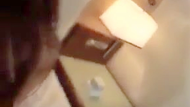 Japanese MILF's Explosive Orgasmic Release on Camera