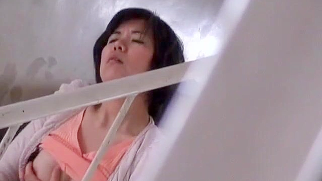 Japanese MILF's Steamy Balcony Masturbation Leads to an Explosive Public Orgasm