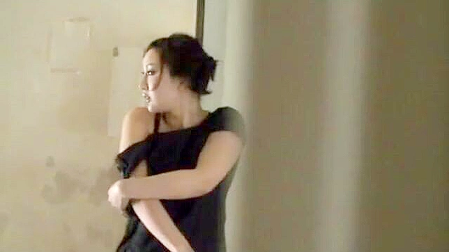 Naughty mature japanese woman pleasures herself in public, reaching climax on the balcony.