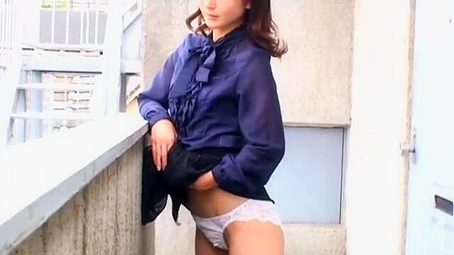 Alluring mature japanese woman giving into her deepest desires, reaching the peak of ecstasy on the balcony.
