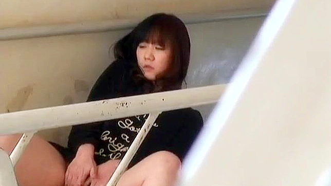 Enchanting mature japanese woman spreading her legs, basking in orgasmic delight on the balcony.