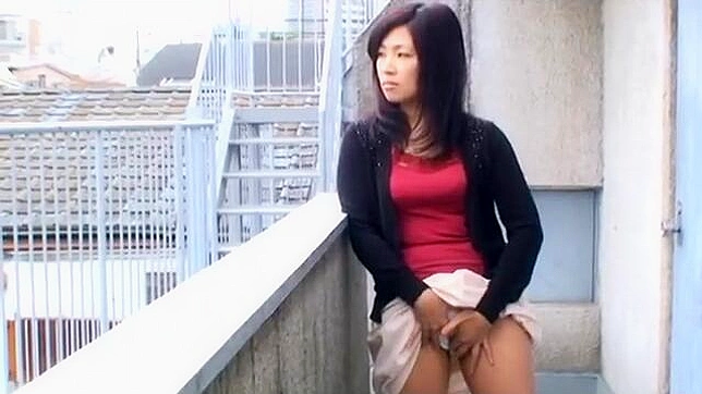 Sultry mature japanese woman taking charge, submitting to her desires on the balcony.