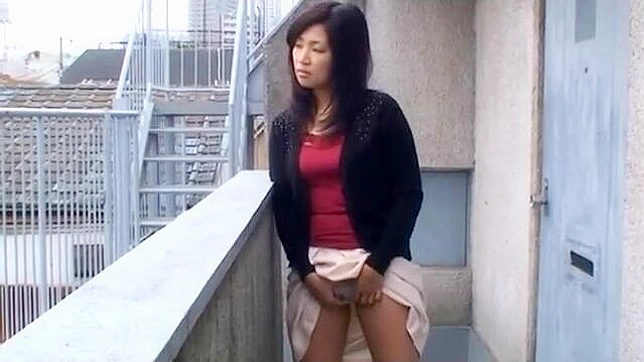 Sultry mature japanese woman taking charge, submitting to her desires on the balcony.