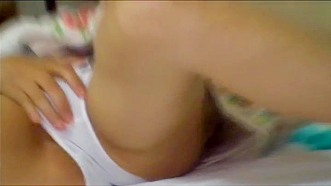 Beautiful Japanese Woman Delights in Hidden Cam Masturbation for Jaw-Dropping Orgasmic Fireworks