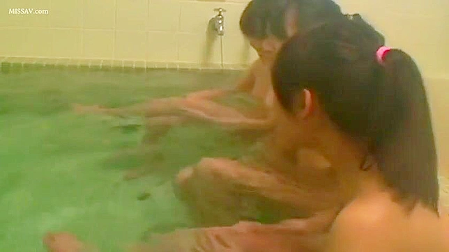 Scandalous Spying! Japanese Beauty Girls Exposes All in Steamy Public Shower!