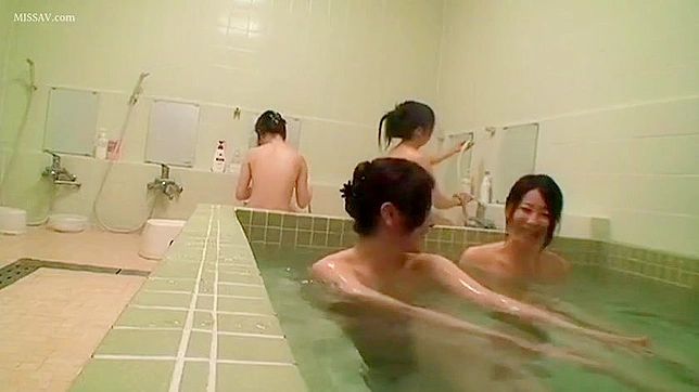 Voyeur's Delight! Japanese Beauty's Nude Body in Steamy Public Shower!