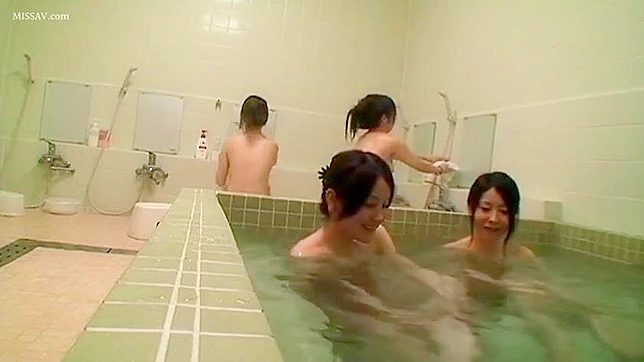 Voyeur's Delight! Japanese Beauty's Nude Body in Steamy Public Shower!