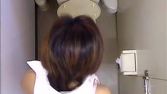 Intense masturbation session by Japanese office lady caught on spy cam.