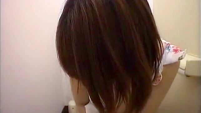 Japanese office lady's carnal desires exposed by sneaky spy cam in the toilet.