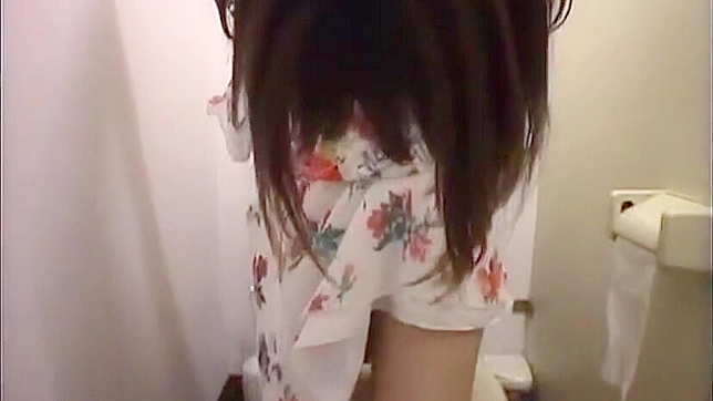 Japanese office lady's carnal desires exposed by sneaky spy cam in the toilet.