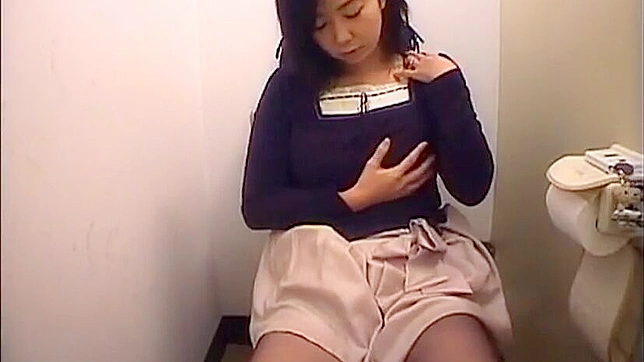 Spy Cam Uncovers a Steamy Japanese Office Lady Masturbation Session