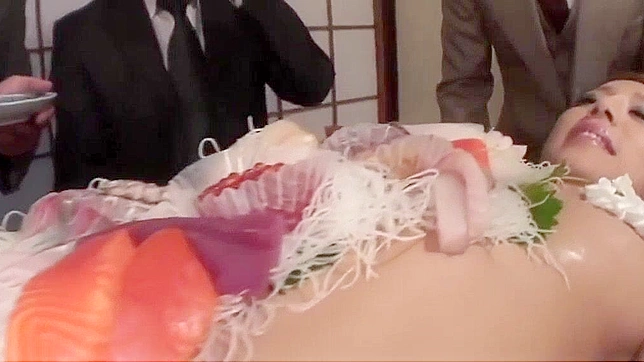 Jav Porn Video ~ Business Men Eat Sushi Out of a Naked Girl's Body