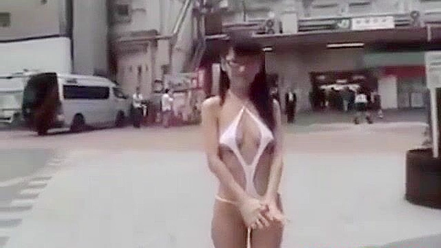 Japanese Beauty Walks Semi-Nude in Tokyo Street - HD Video