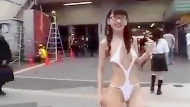 Japanese Beauty Walks Semi-Nude in Tokyo Street - HD Video