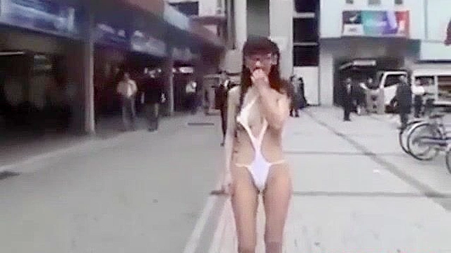 Japanese Beauty Walks Semi-Nude in Tokyo Street - HD Video