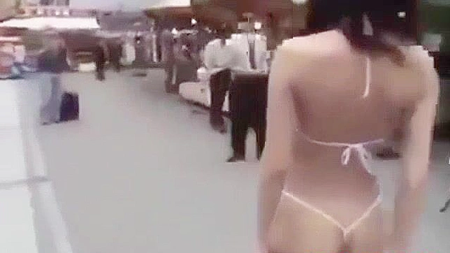 Japanese Beauty Walks Semi-Nude in Tokyo Street - HD Video