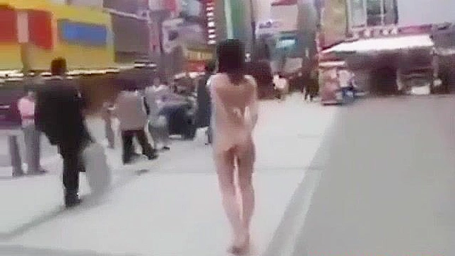 Japanese Beauty Walks Semi-Nude in Tokyo Street - HD Video