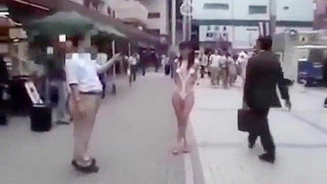 Japanese Beauty Walks Semi-Nude in Tokyo Street - HD Video