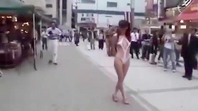 Japanese Beauty Walks Semi-Nude in Tokyo Street - HD Video