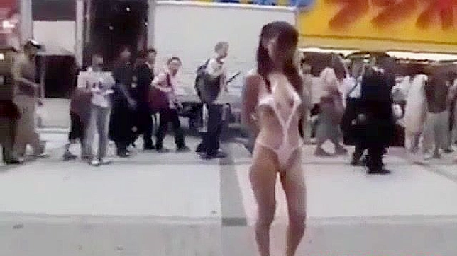 Japanese Beauty Walks Semi-Nude in Tokyo Street - HD Video