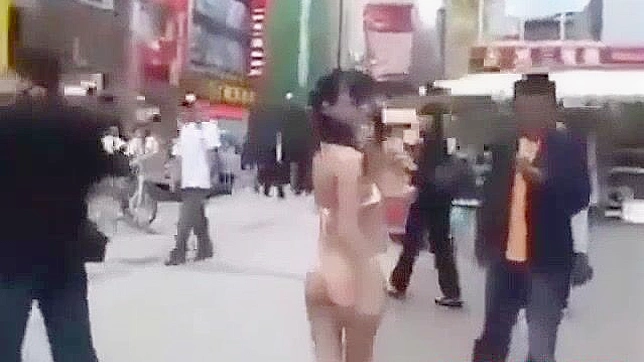 Japanese Beauty Walks Semi-Nude in Tokyo Street - HD Video