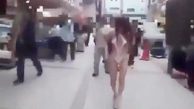 Japanese Beauty Walks Semi-Nude in Tokyo Street - HD Video