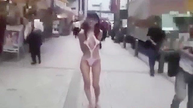 Japanese Beauty Walks Semi-Nude in Tokyo Street - HD Video