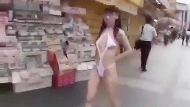 Japanese Beauty Walks Semi-Nude in Tokyo Street - HD Video