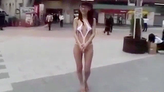 Japanese Beauty Walks Semi-Nude in Tokyo Street - HD Video