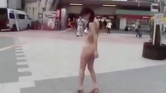 Japanese Beauty Walks Semi-Nude in Tokyo Street - HD Video