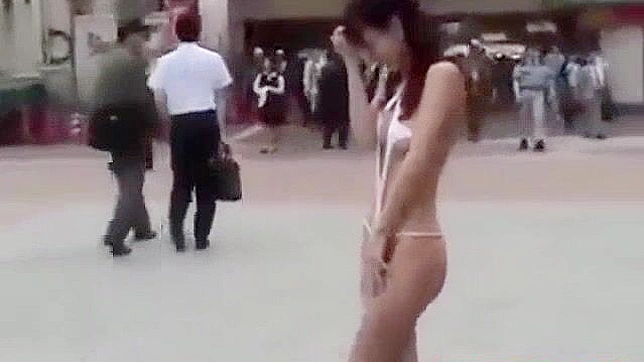 Japanese Beauty Walks Semi-Nude in Tokyo Street - HD Video