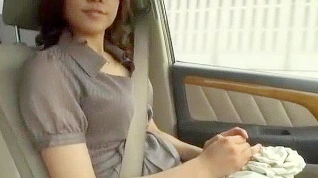 Japanese babe Riko Chitose in mind-blowing masturbation scene on car JAV