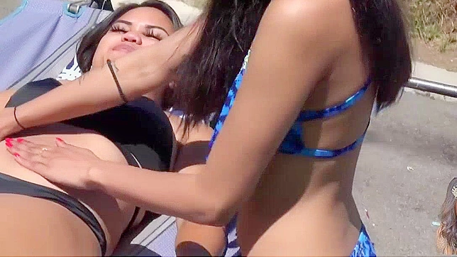 Japanese Babe Gets a Taste of Sun Tan Lotion, Gets Rubbed Down by a Stranger