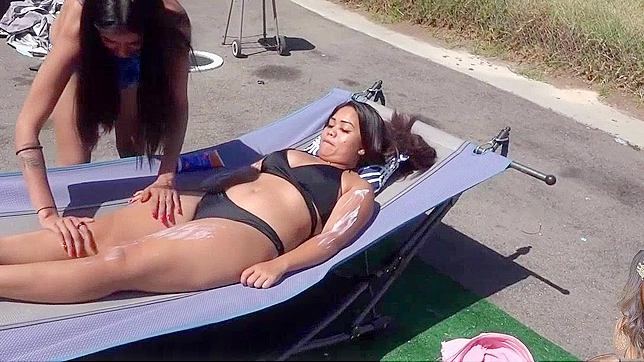 Japanese Babe Gets a Taste of Sun Tan Lotion, Gets Rubbed Down by a Stranger