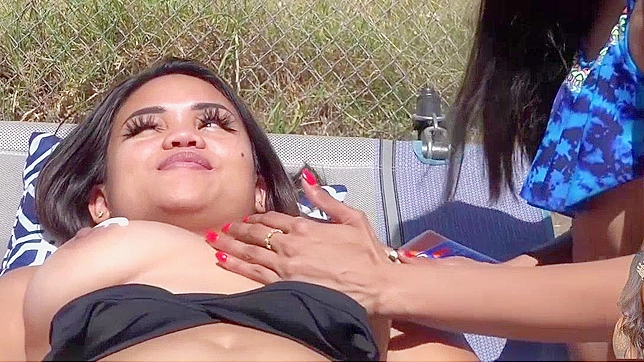 Japanese Babe Gets a Taste of Sun Tan Lotion, Gets Rubbed Down by a Stranger