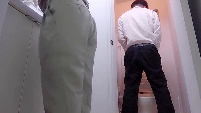 Japanese Babe Gives Steamy Blowjob in Office Bathroom - Must Watch!