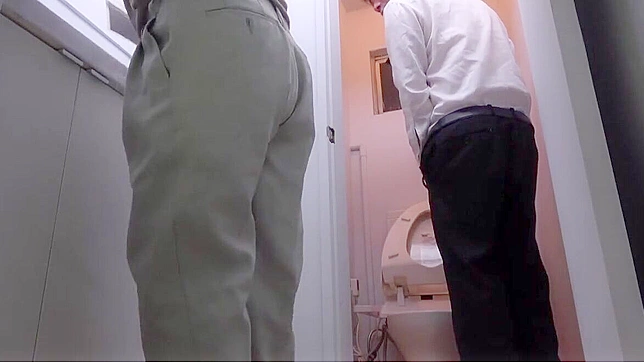 Japanese Babe Gives Steamy Blowjob in Office Bathroom - Must Watch!