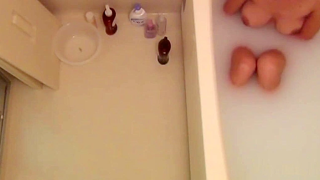 Watch This Asian Goddess Take a Sensual Bath While Masturbating!