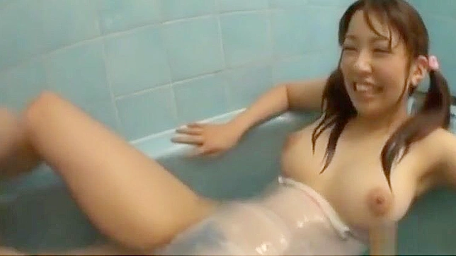 Cute Asian Teen Gets Wet and Wild in the Bathtub - JAV Style!