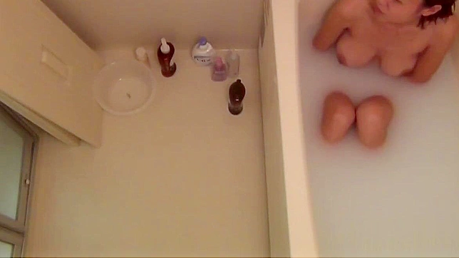 Caught on Camera ~ 18+ year-old Asian Beauty Takes a Sensual Bath and Teases Herself!