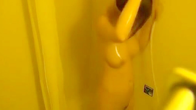 Caught on Camera ~ Watch This Luscious Asian Enchantress Take a Steamy Shower!